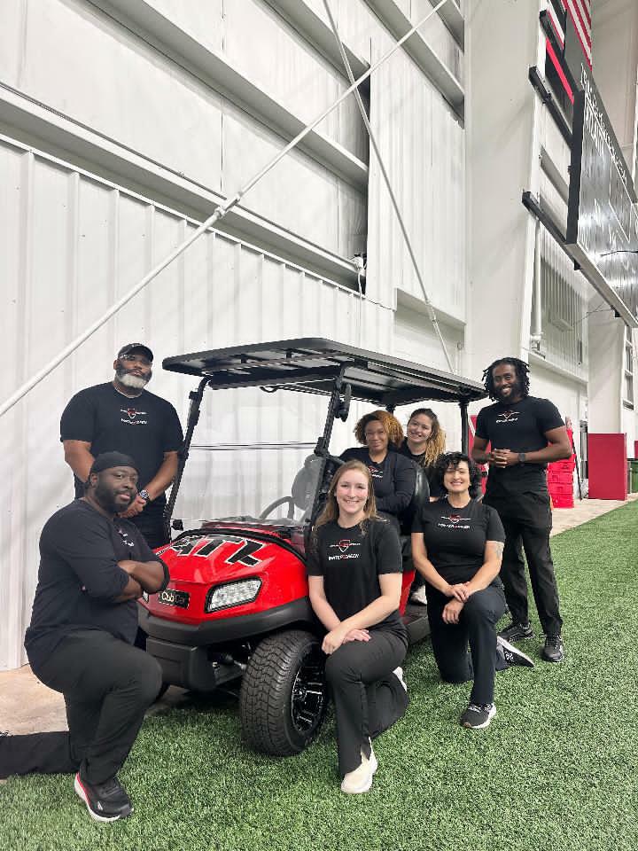 Josh Bell with the recovery team at the Atlanta Falcons training facility